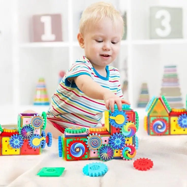 Child building electric gear blocks toy
