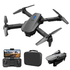 Kids using E88 4K drone camera with accessories for learning and fun