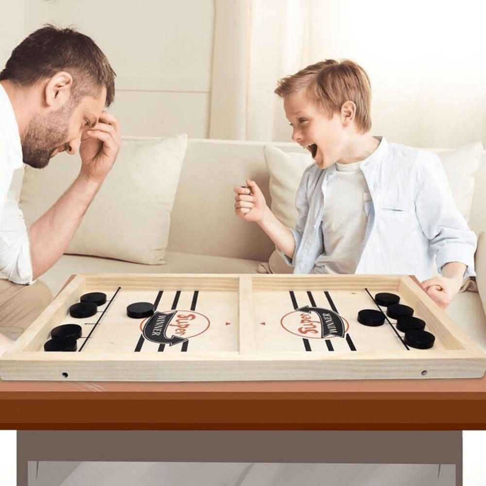 Kids playing Pucket sling puck game